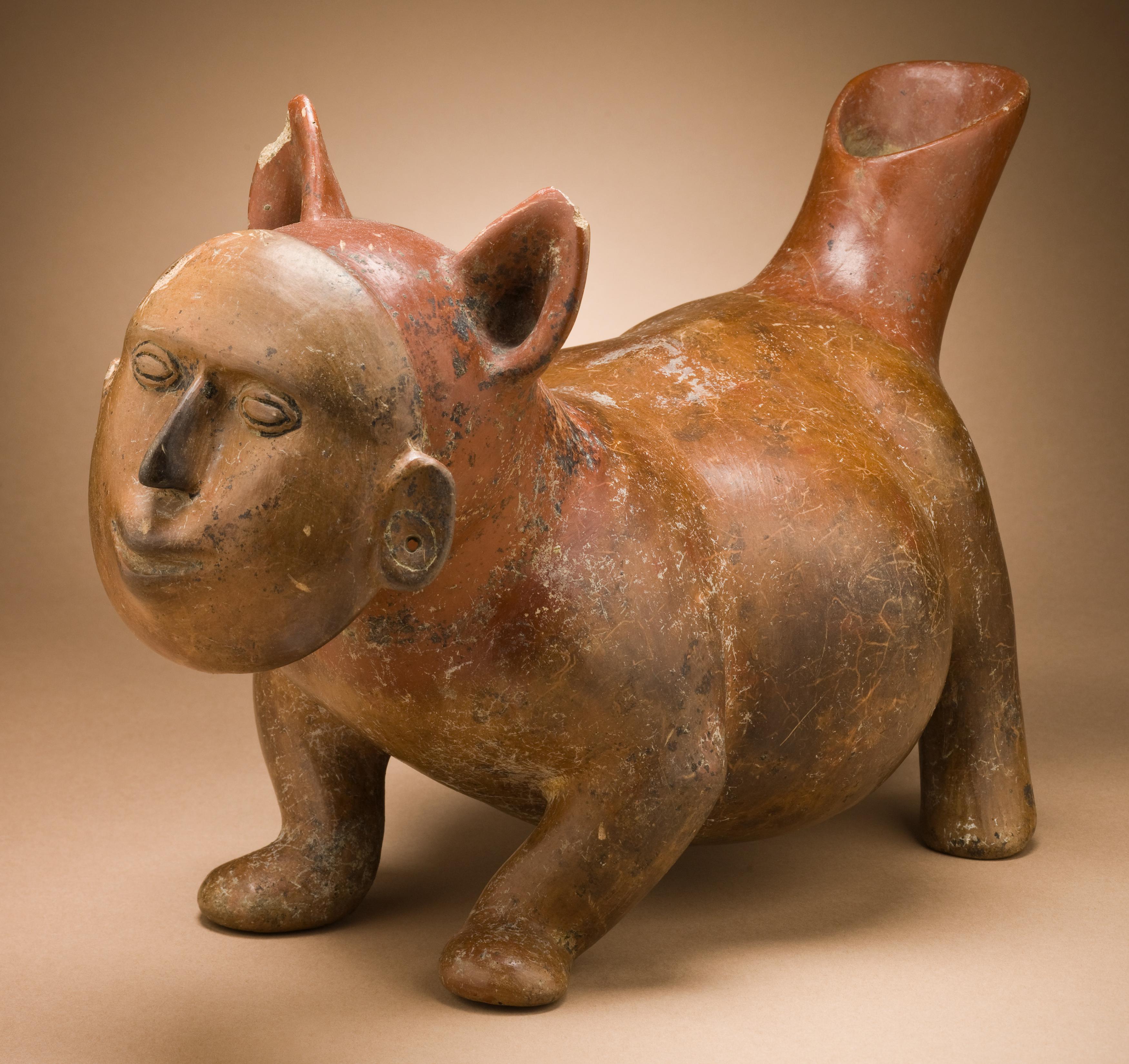 Ceramic dog with human mask. Colima, Mexico, 200 BC–500 AD.jpg