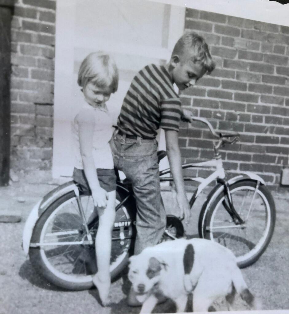 My dad, my aunt, and their dog circa 1954.jpg