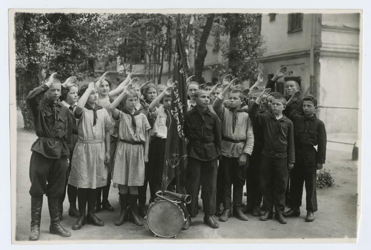 A group of Soviet kids in 1918. The scarves around their necks indicates membership of the Pioneers, a Communist youth organization similar to the Boy Scouts.jpg