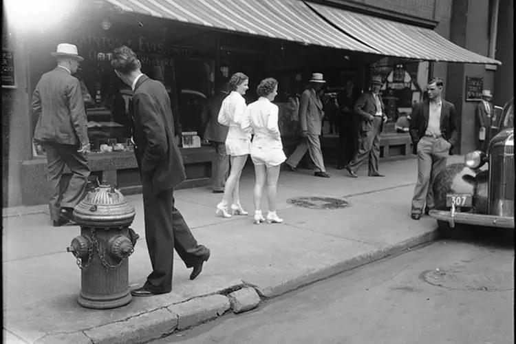 2 women wearing short shorts attract attention on a Toronto street, 1937.jpg