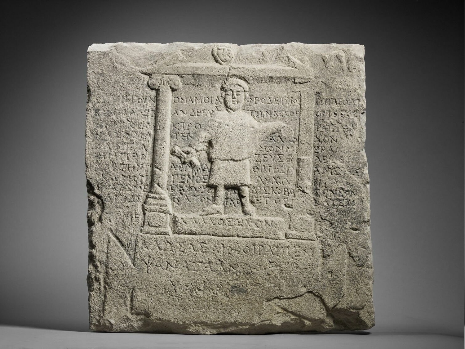 Ancient greek tombstone describes the death of Aphrodisios, who died the most pathetic death because of his wife, a dirty adulteress and her secret lover, 'who threw me from the heights like a discus'.JPG