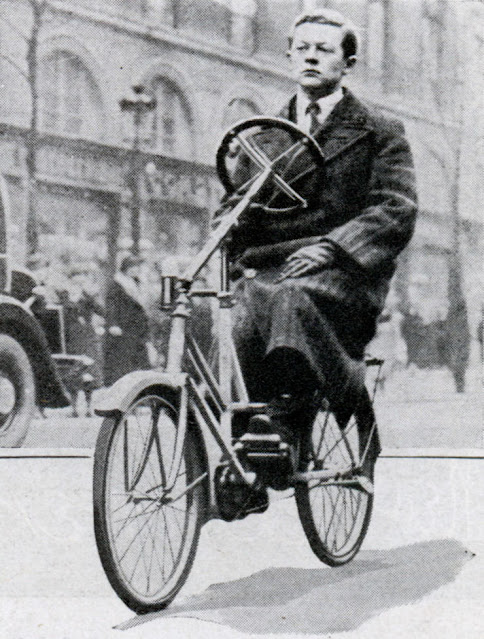 Bicycle Has Steering Wheel and Chairlike Seat, 1936.jpeg