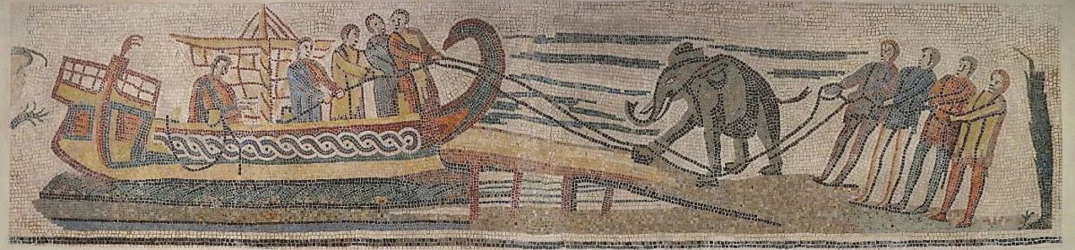 Roman mosaic from Veii (now Isola Farnese in Italy) that shows an African elephant being loaded onto an antique ship. 3rd-4th century CE.jpg