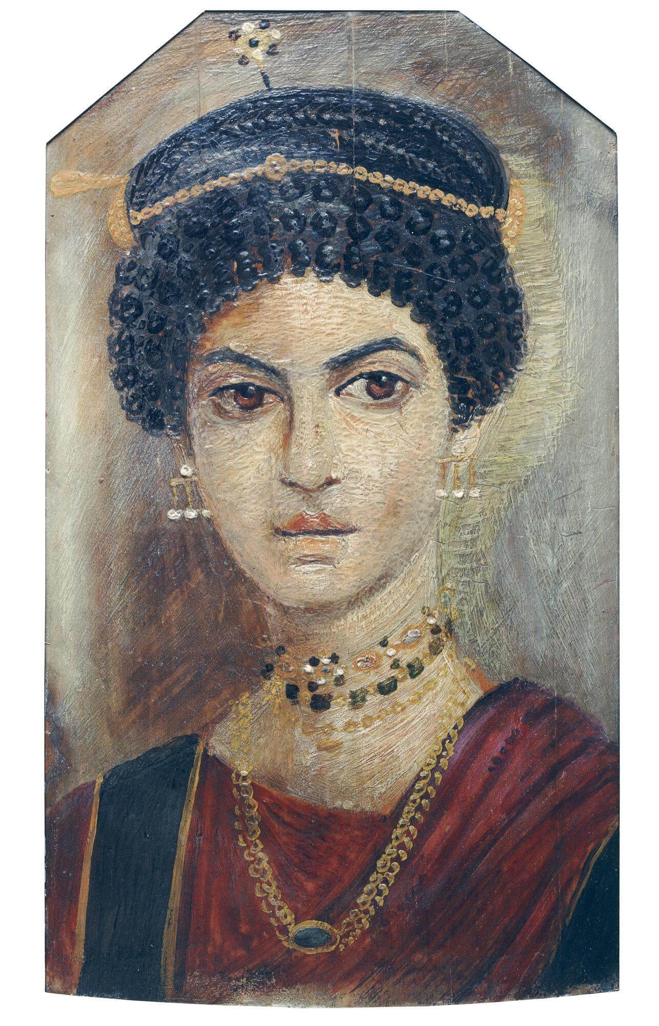 Mummy portrait. A young woman in a crimson tunic and a rich array of jewellery.jpg