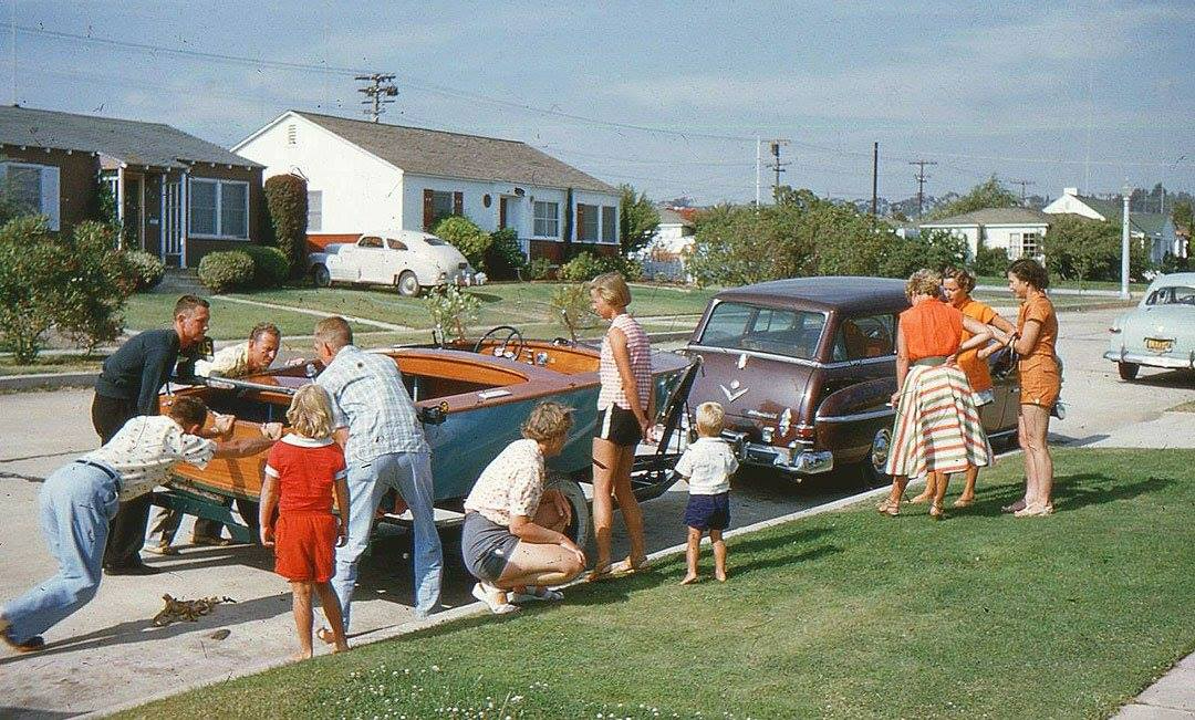 Hitching up the boat for a family road trip. 1950s.png
