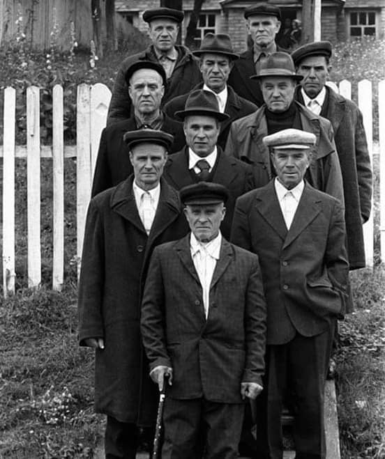 The Lysenko Brothers smiling for a photo in 1982. All 10 of them fought in World War II.png