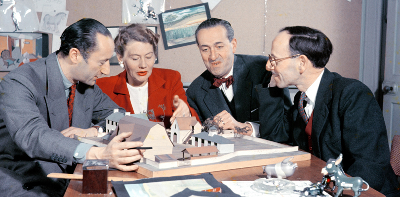 Composer Matyas Seiber (right) with John Halas, Joy Batchelor, and John Reed discuss the models for Animal Farm (1954).jpeg