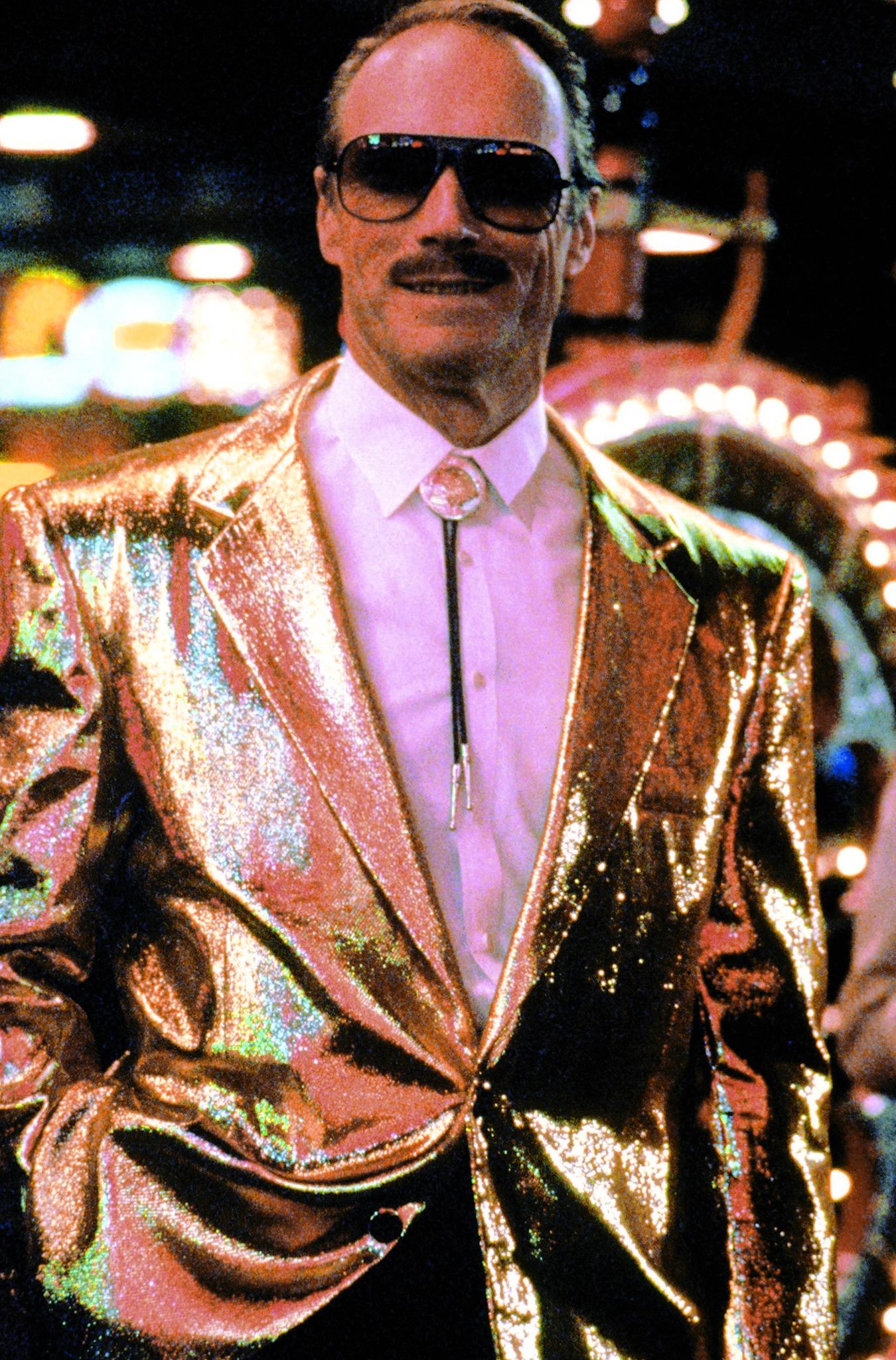 Clint Eastwood wearing a gold lamé suit in Pink Cadillac (1989).jpg