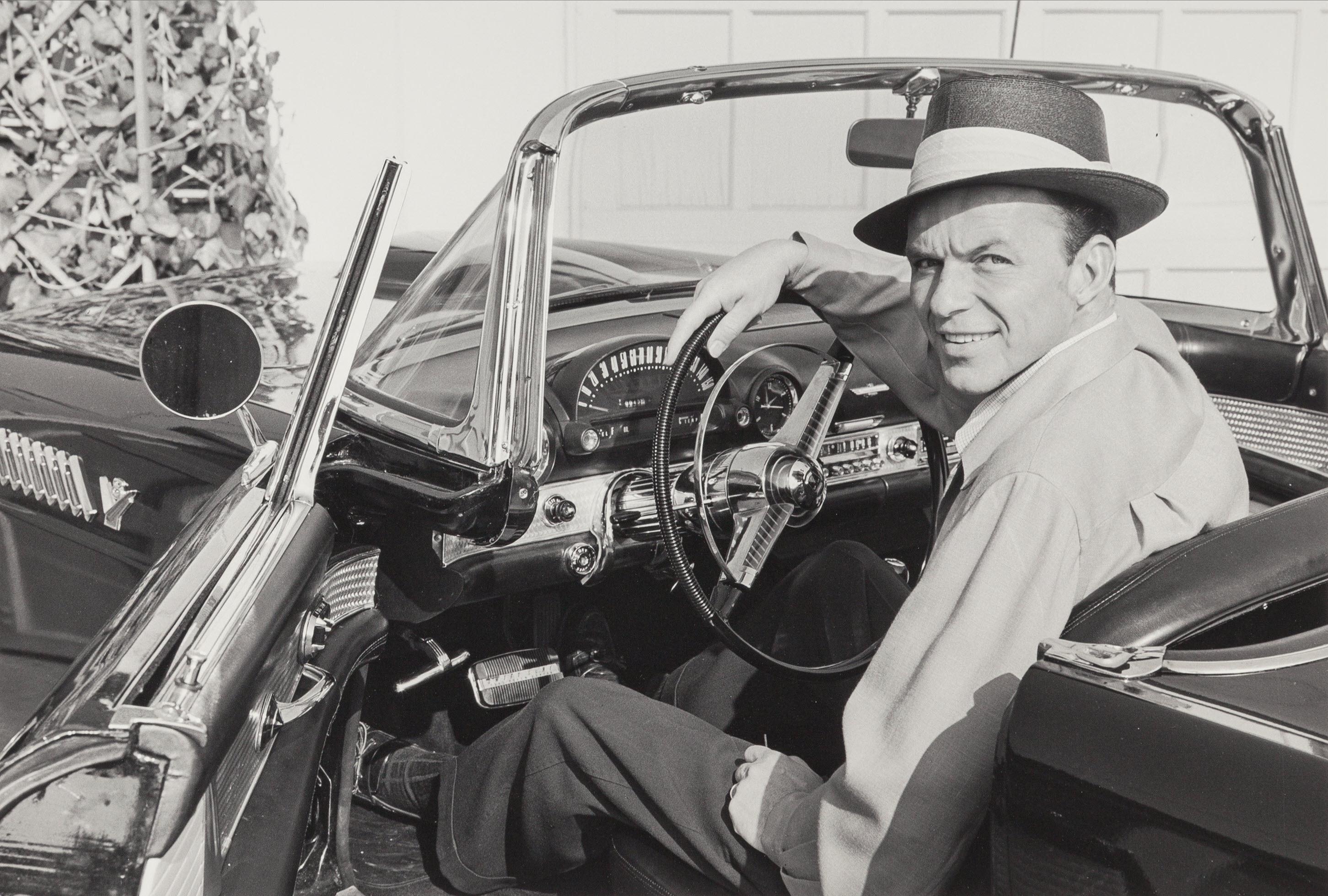 Frank Sinatra in his T-Bird, 1955.jpg