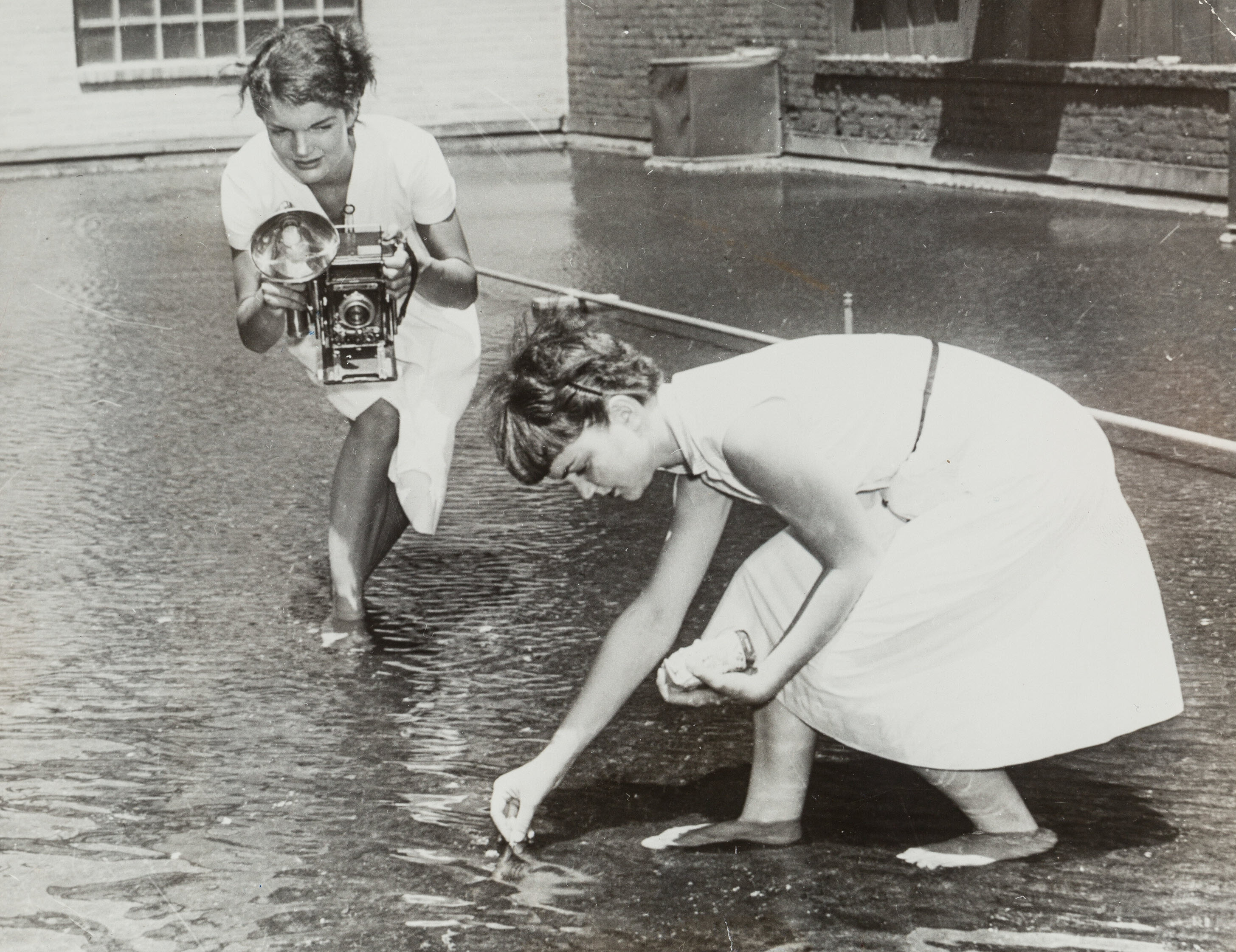 Washington Times-Herald 'Inquiring Camera Girl' Jackie Bouvier (Kennedy) was dispatched daily to photograph people and ask them topical questions of the day, 1951.jpg