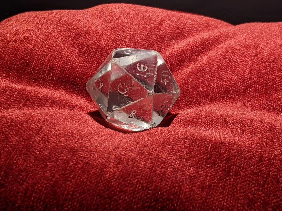 A 20 sided Roman Rock Crystal Dice. 1st-2nd Century AD. Louvre Museum. Possibly used in fortune telling, Greek letter on each face may have corresponded to a reference in a divination manual.jpg