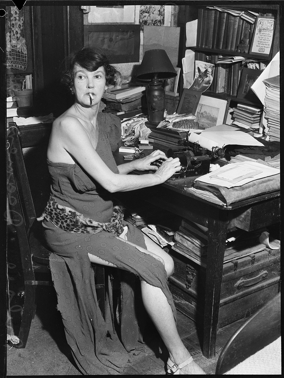Dulcie Deamer at her writing desk, novelist, poet, journalist, actor and founder and committee member of the Fellowship of Australian Writers, 1 April 1950.jpg
