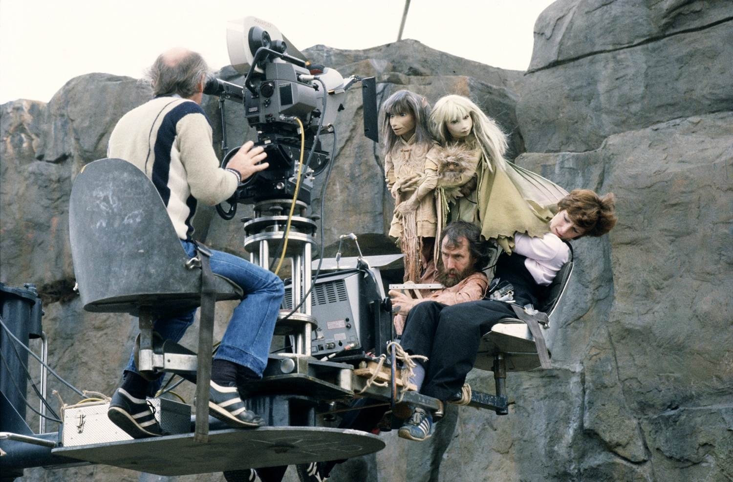 Jim Henson and Kathryn Mullen operating Jen and Kira during the filming of The Dark Crystal, 1980.jpg
