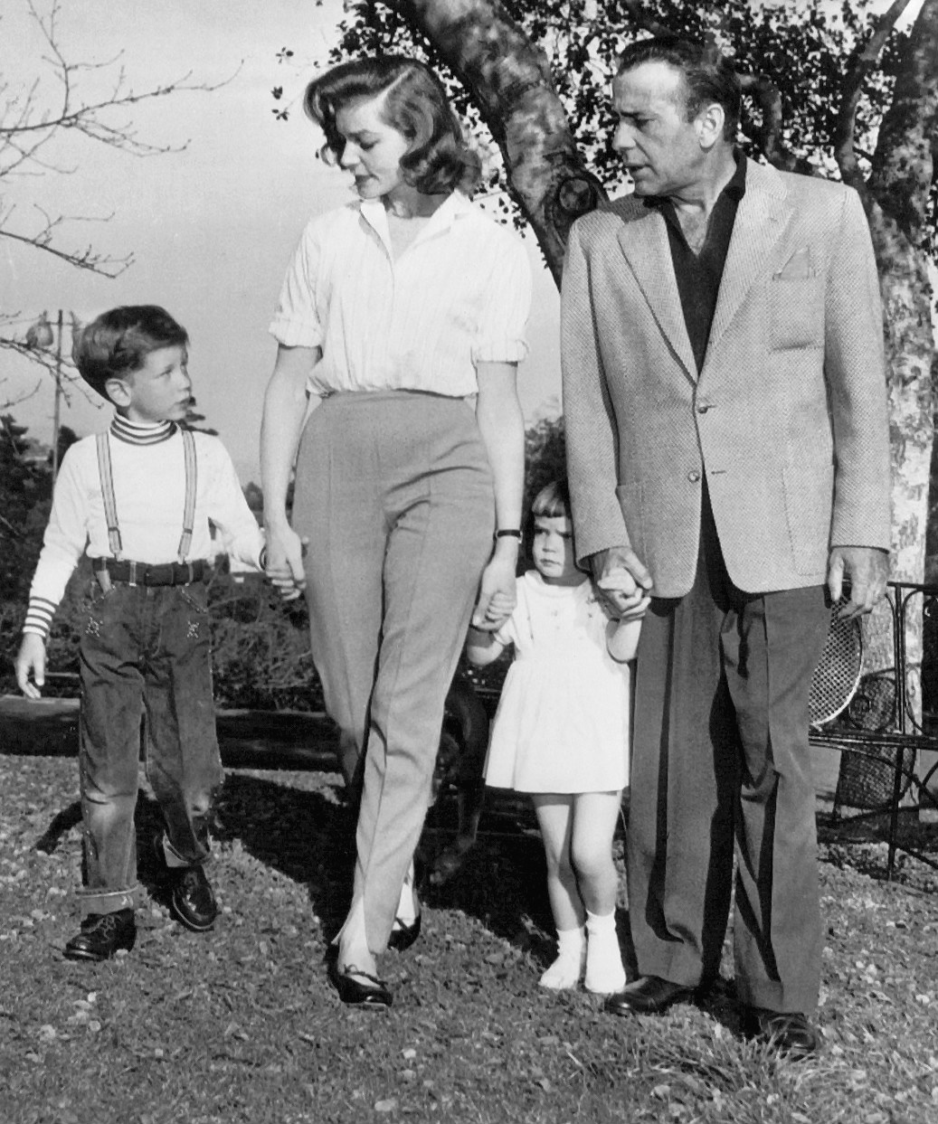 Humphrey Bogart and his family in April 1956 — son Stephen, wife Lauren Bacall, daughter Leslie and Bogart.jpg
