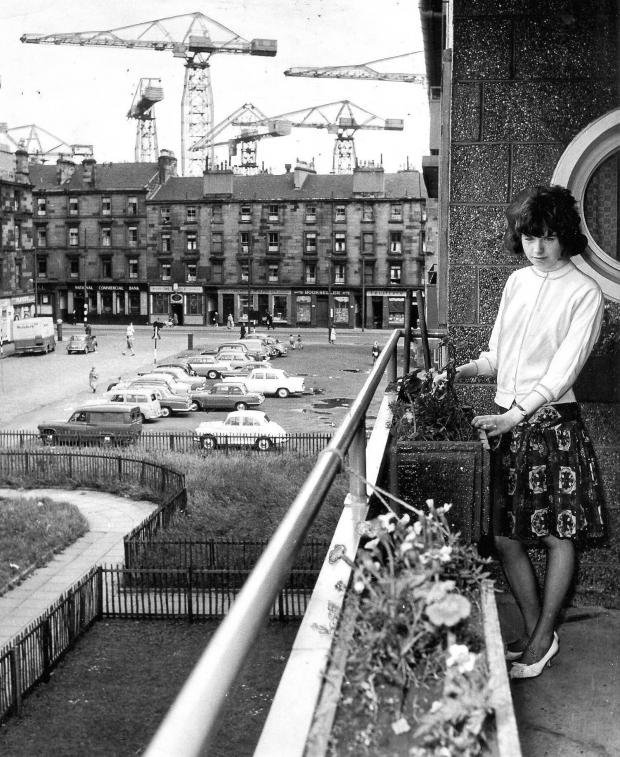 16-year-old Catherine Donaghey on the balcony of her flat on Orkney Street in Govan, Glasgow, 1963.jpg