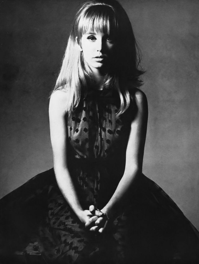 Jill Townsend in black point d'esprit lace dress with gathered top, halter back and short skirt by Donald Brooks, photo by Bert Stern, Vogue, February 15, 1966.jpeg