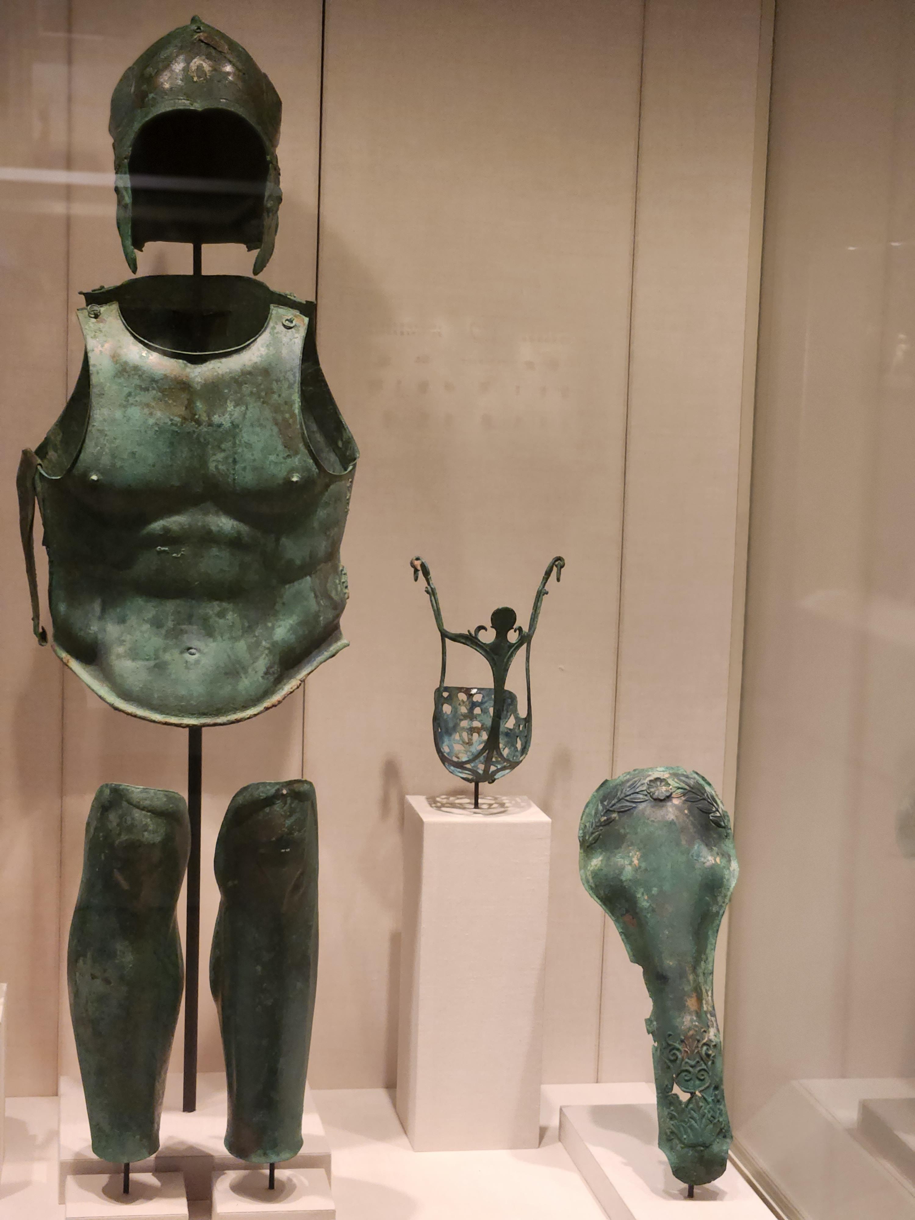 Apulian Greek bronze armor, ca. 330 BC, including helmet with horse's head on each cheekpiece, cuirass, greaves, and horse's chamfron and muzzle. Loaned to the Metropolitan Museum of Art.jpg