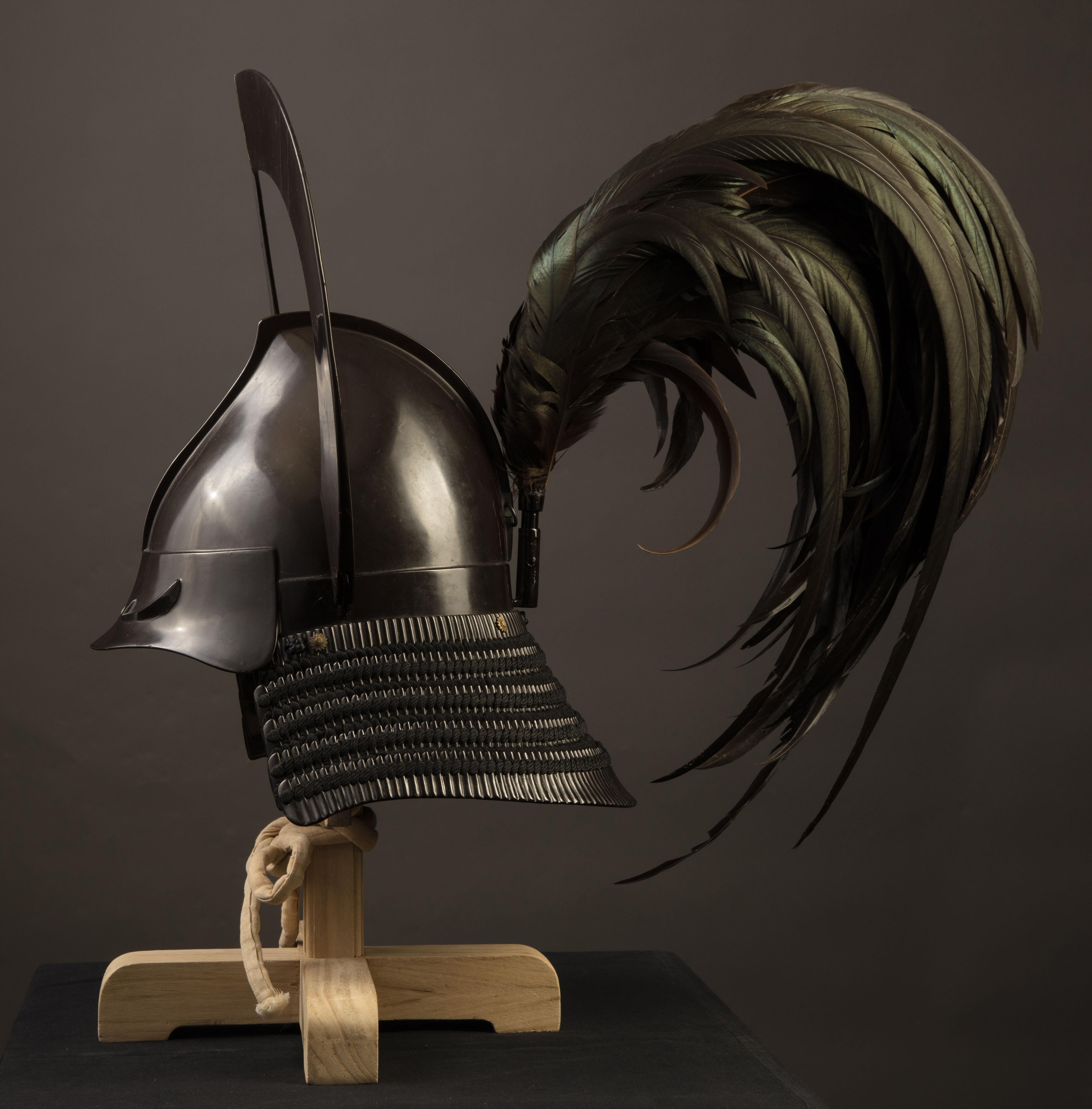 Lord Tachibana Muneshige's black lacquered helmet, with ornamental feathers. Japan, Edo period, around 1638.jpg