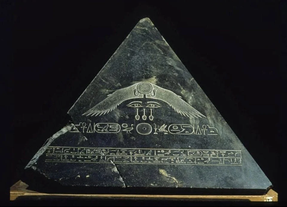 A rare intact pyramid capstone, one of the few known in existence. The capstone belonged to the Black Pyramid, built by King Amenemhat III, c 1850-1800 BC..png