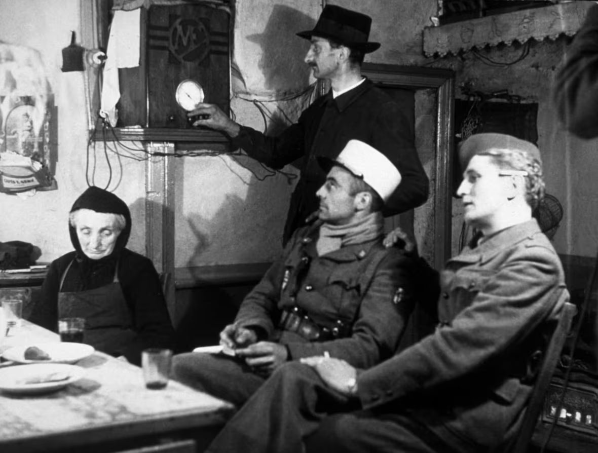 Members of the French Resistance in France, listening to radio messages from London. 1940.jpg