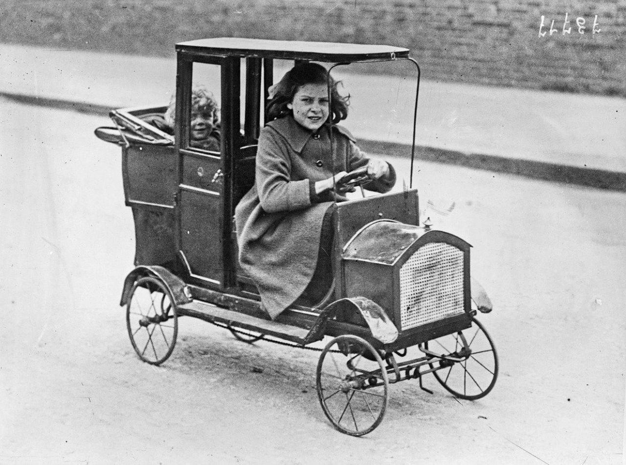 1922. A pedal car that can hold a passenger...(The Jazz Age Vehicle Archive).jpg