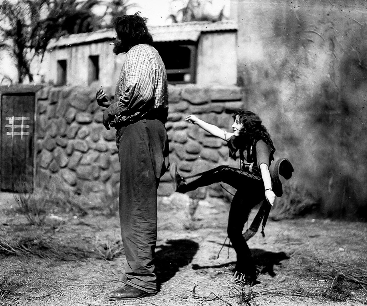 Jobyna Ralston has some fun with John Aasen on the set of Why Worry... (1923).jpg