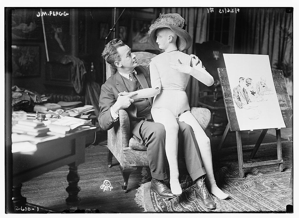 James Montgomery Flagg poses with a girl manikin, 1913.jpg