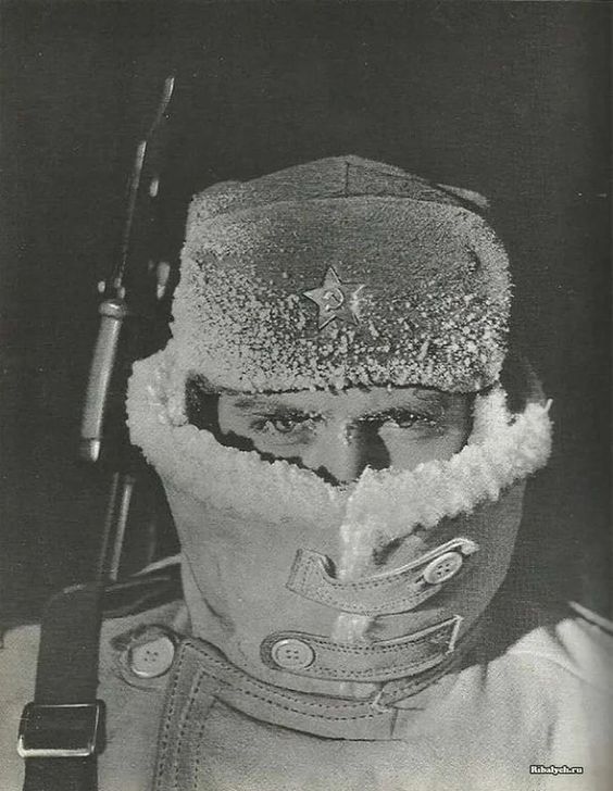 Soviet border guard on duty wearing winter uniform, 1960's.jpg