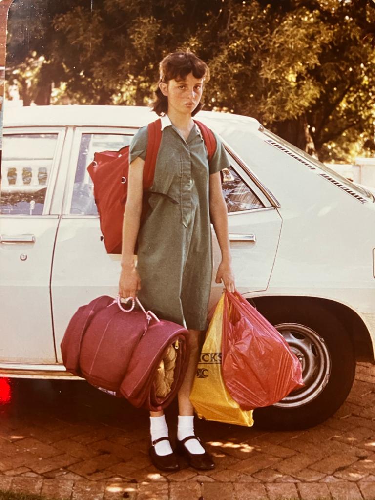 A not-so-happy camper on her way to boarding school. Bloemfontein, South Africa, 1980.jpeg