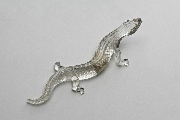 A small figurine of a lizard, carved from hyaline quartz in the Gallo-Roman period.It was buried in a tumulus at Cortil-Noirmont (Belgium) around 2000 years ago.jpeg