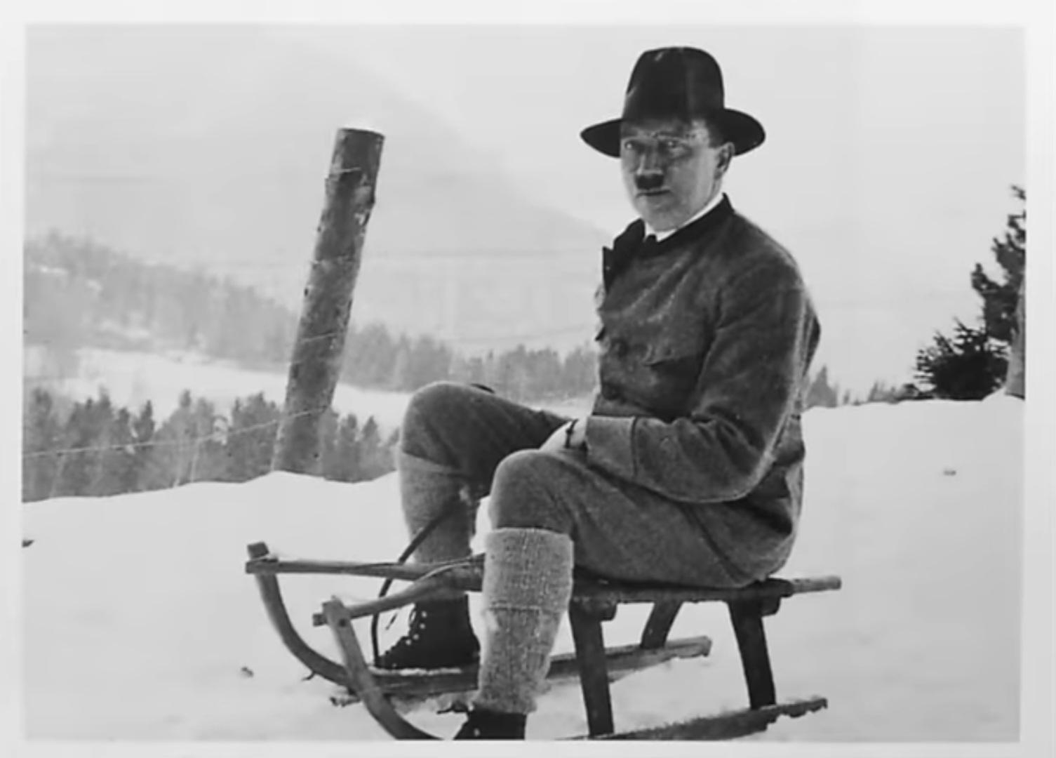 Adolf Hitler on a sled (banned photo during the Nazi regime).jpeg