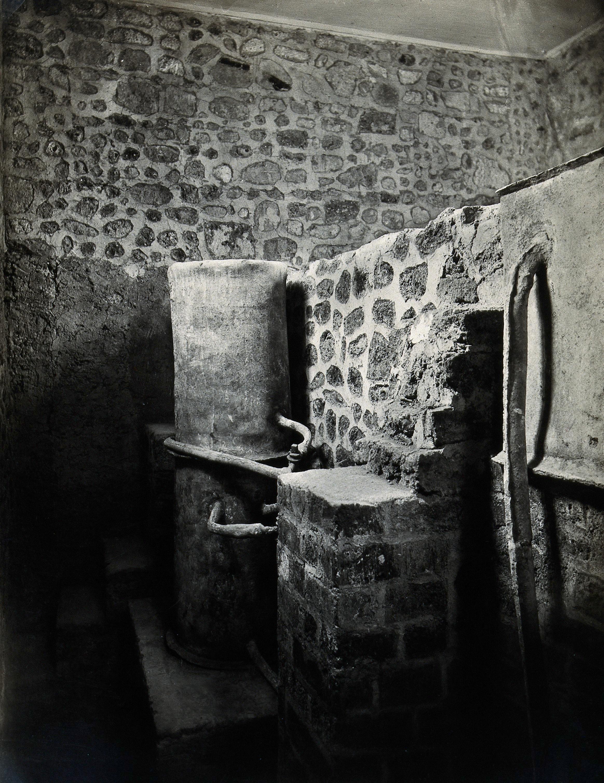 A relatively intact Roman water boiler with all its pipes, at the Villa della Pisanella in Boscoreale, Italy, 1st century BCE. Photograph by Fratelli Alinari, 1931.jpeg