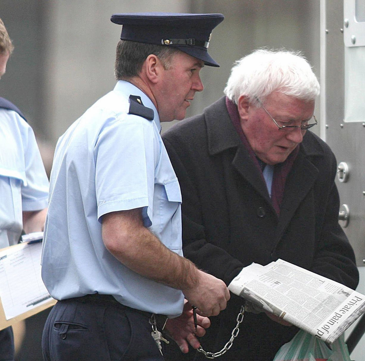 Шон Гарланд перед слушанием об экстрадиции  по обвинению в масштабной подделке наличных денег. Дублин, 2009.jpg