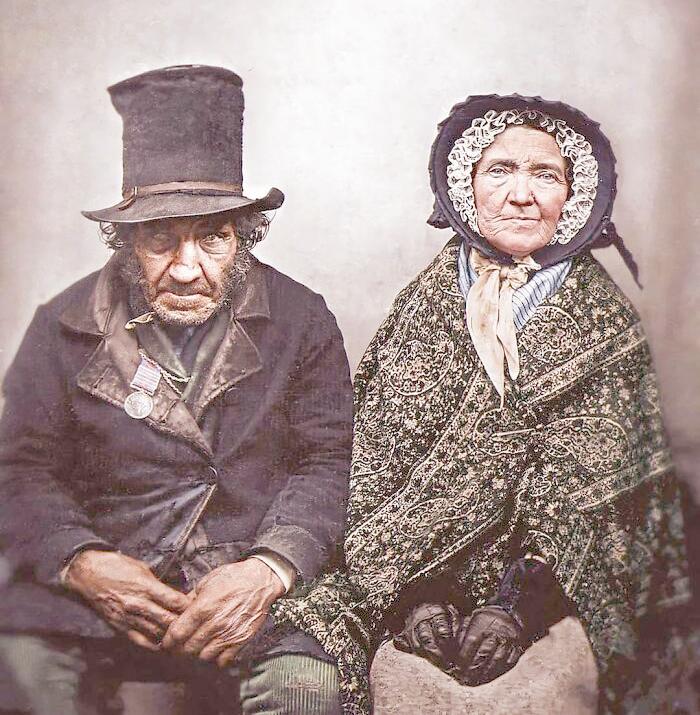 A British veteran of the Napoleonic Wars and his wife sitting for a photograph in the (1860′s).jpeg