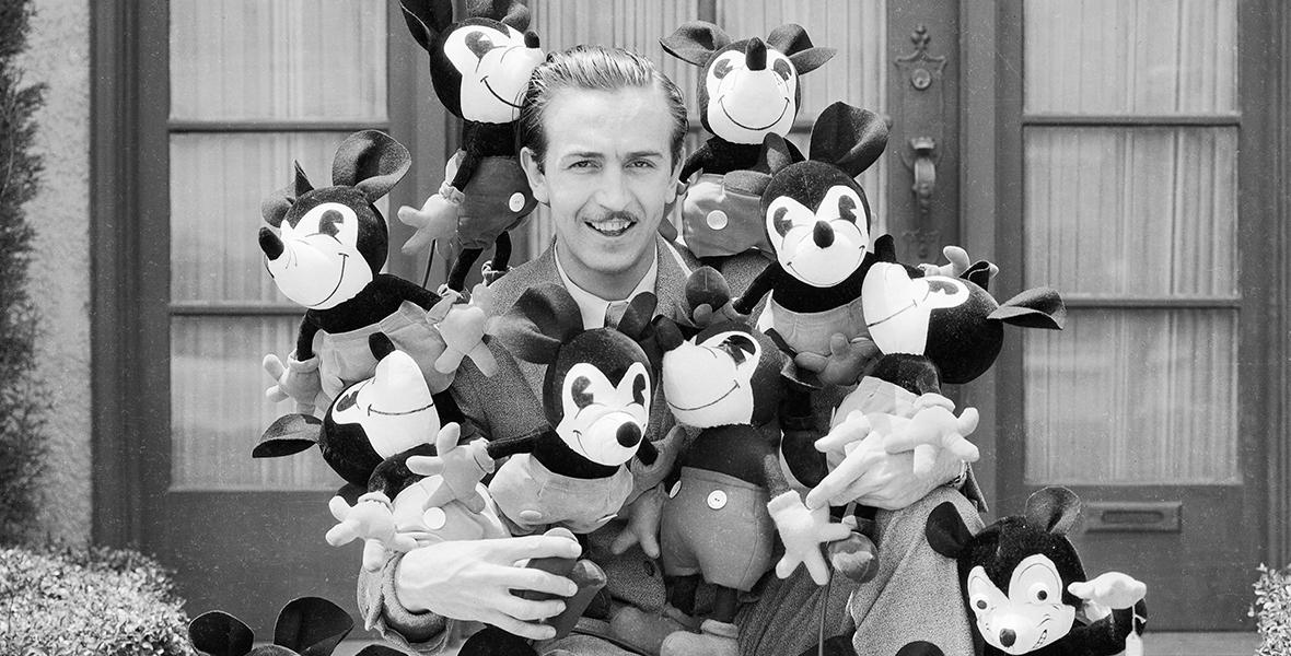 Walt Disney with Mickeys, c. 1930.jpeg