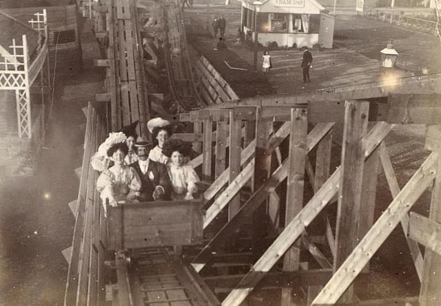 People riding on a Victorian rollercoaster around 1900.jpeg