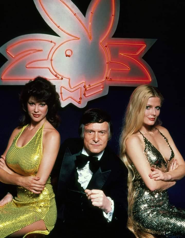 Hugh Hefner with Playmates Candy loving and Debra jo Fondren circa 1979.jpeg