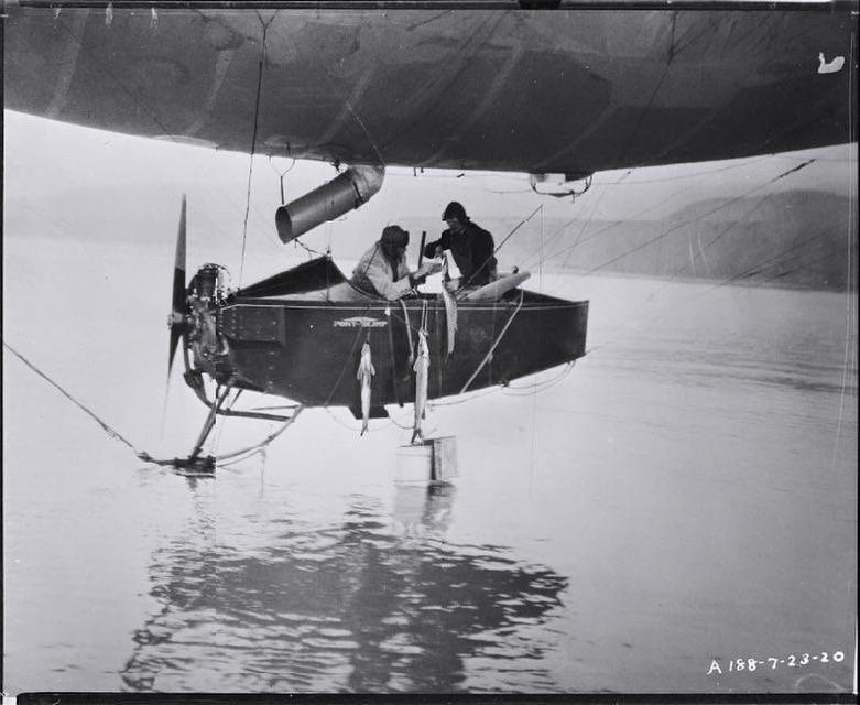 Fishing from a Goodyear pony blimp. C. 1920.jpeg