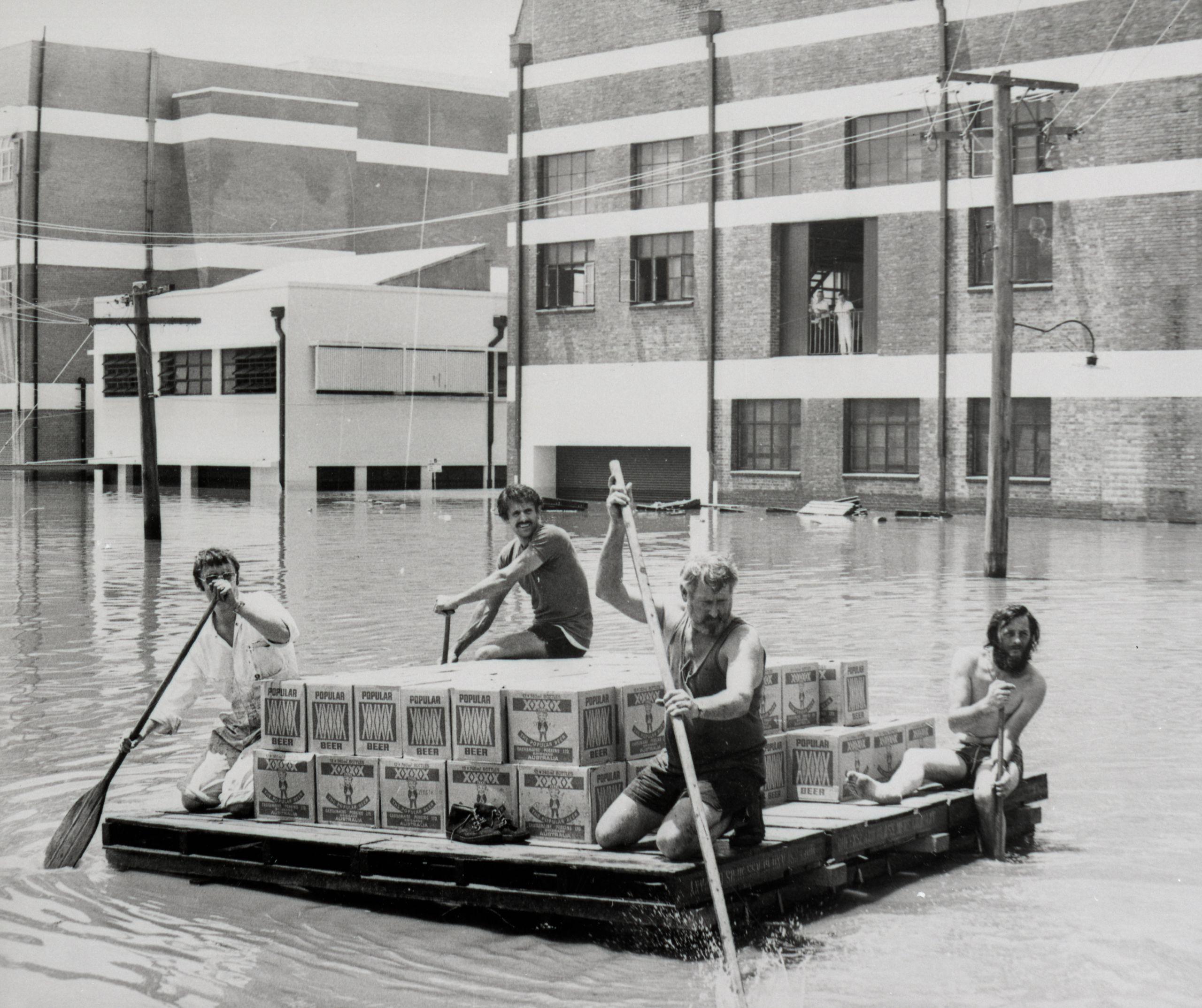 Brisbane flood January 24 1974 with some people rescuing beer from a brewery.jpeg