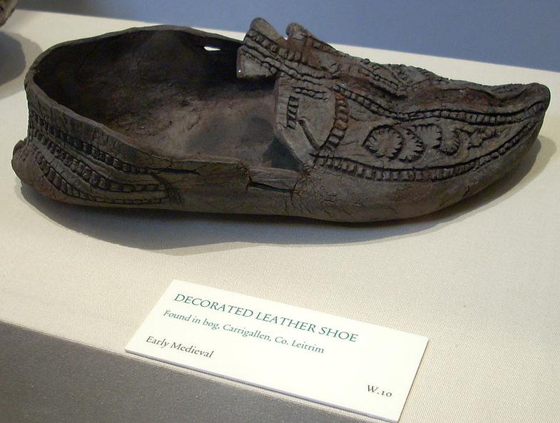 A decorated leather shoe found in a bog in Carrigallen, Co. Leitrim. Dated to the early middle ages, now housed at the National Museum of Ireland.jpeg