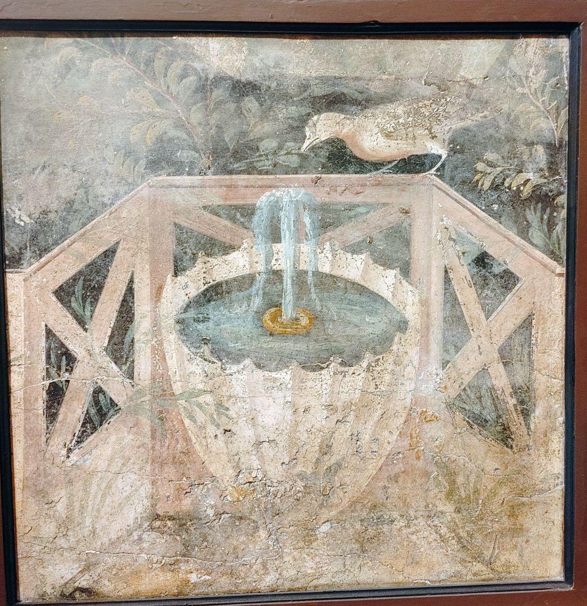 Roman fresco depicting a fountain and a bird. The object dates back to the 1st century CE; found in Pompeii. The artifact is located in the National Archaeological Museum of Naples.jpeg