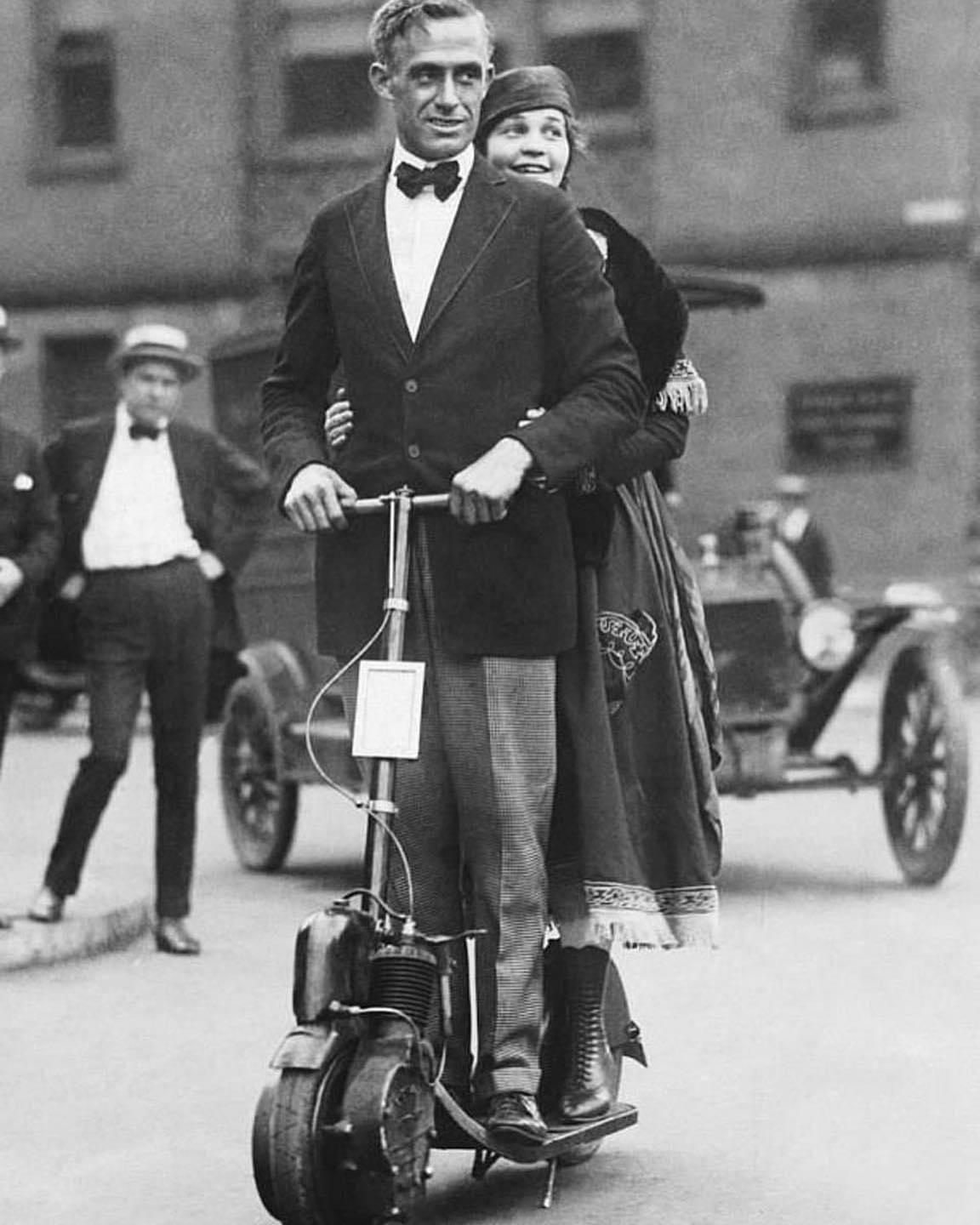 Couple on their electric scooter , 1923.jpeg