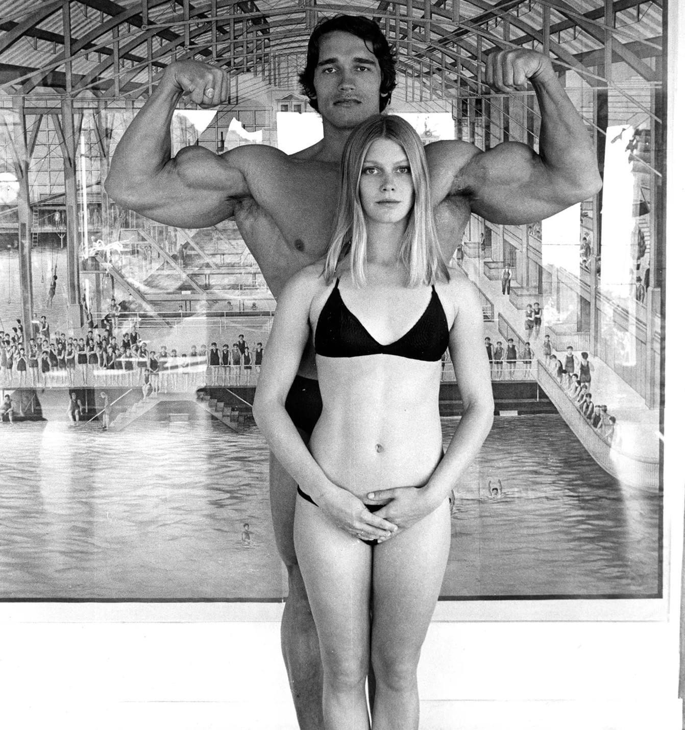 Arnold Shcwarzenegger with Jeff Bridges’s wife, Susan Geston, in 1976.jpeg