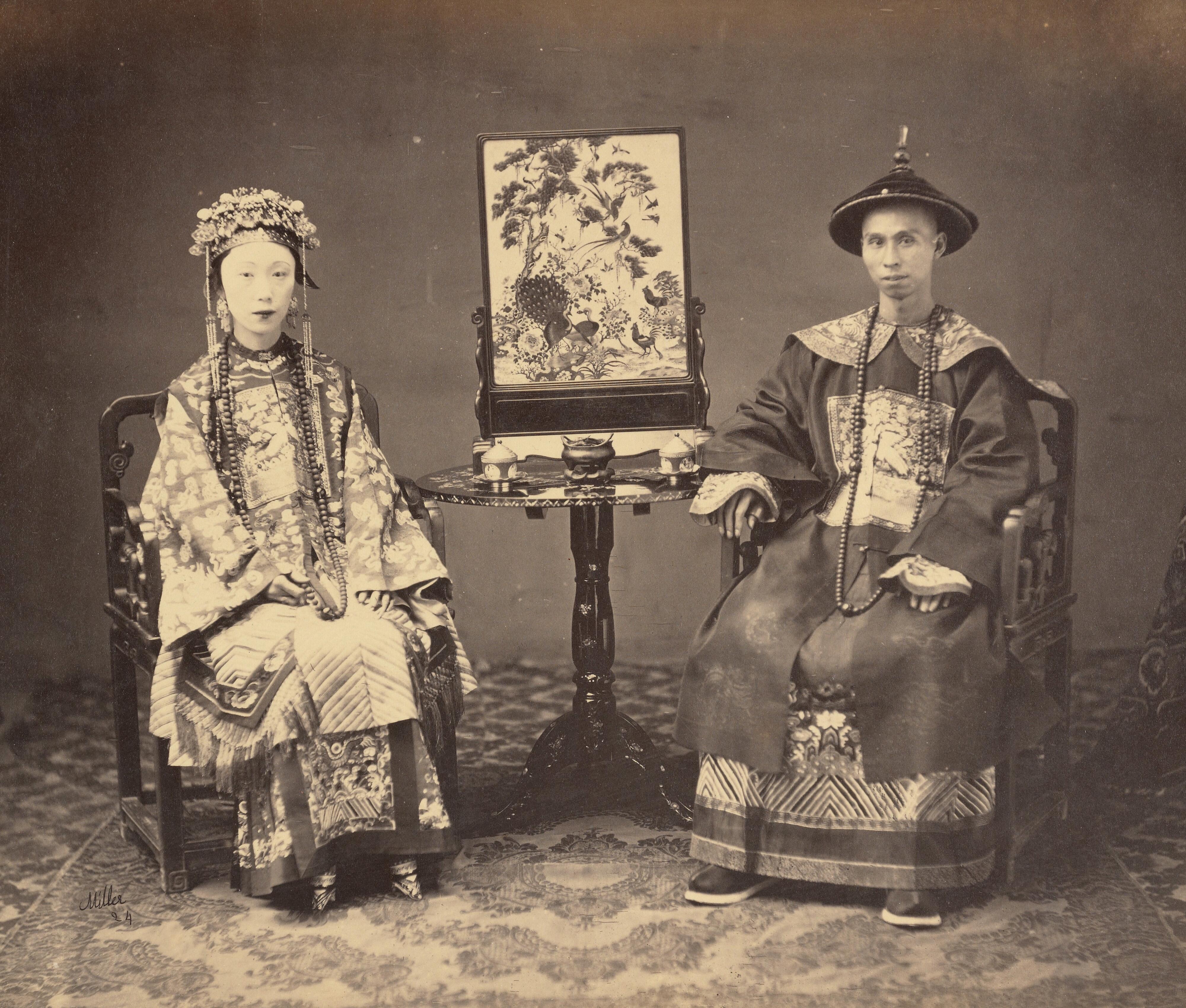 A bureaucrat and his wife. China, 1864.jpeg