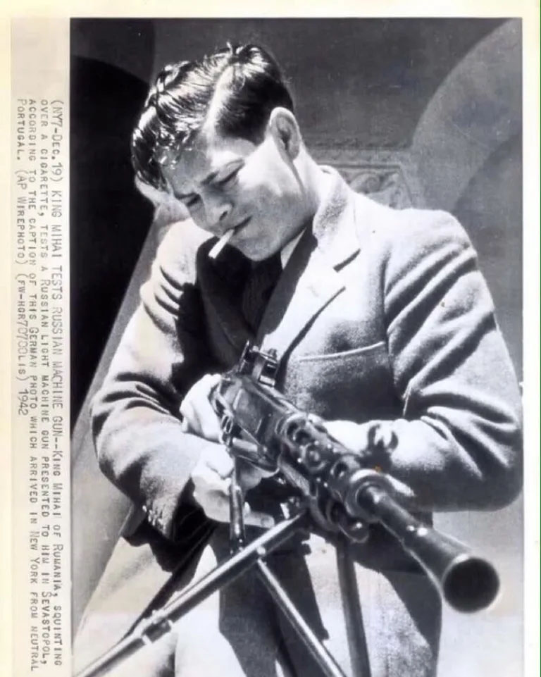 King Michael I of Romania at the age of 21, testing a Russian machine-gun (probably the Degtyaryov--DP-28 machine-gun) in Sevastopol. 1942.jpg