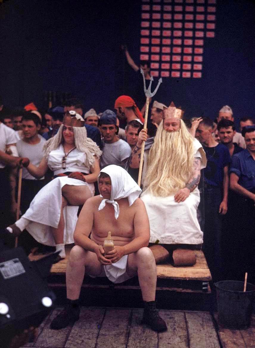 King Neptune oversees a Line crossing ceremony for crossing the Equator on USS Lexington CV-16 in Early 1944.jpeg