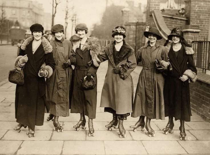 A group of roller skating friends pose for a photo. England, 1926..jpeg