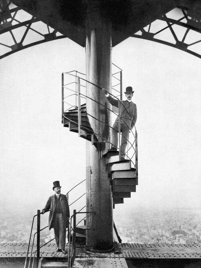 Alexandre Gustave Eiffel, left, explores the completed tower with a friend, 1889.jpeg