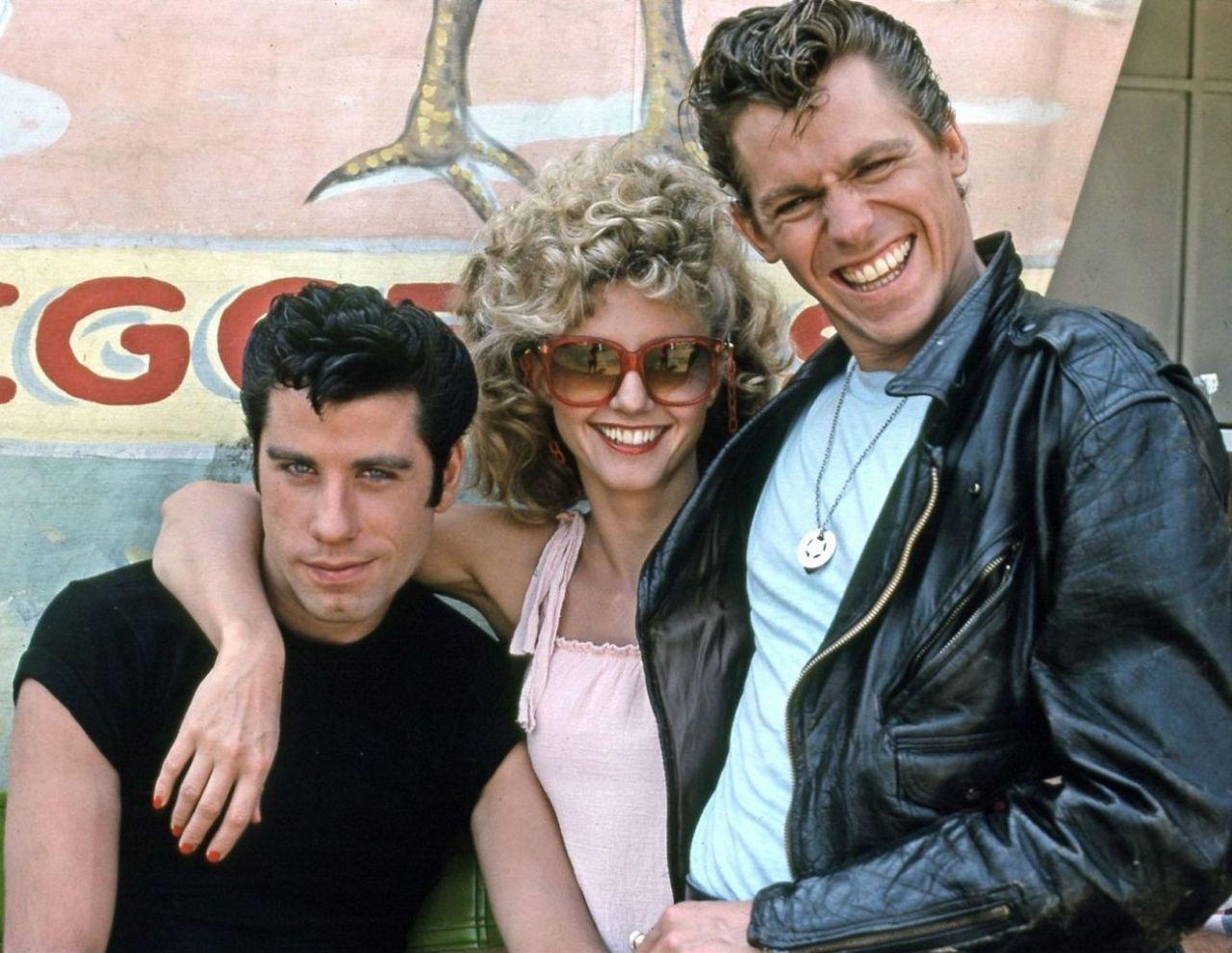 John Travolta, Olivia Newton-John and Jeff Conaway on the set of Grease (1978).jpeg