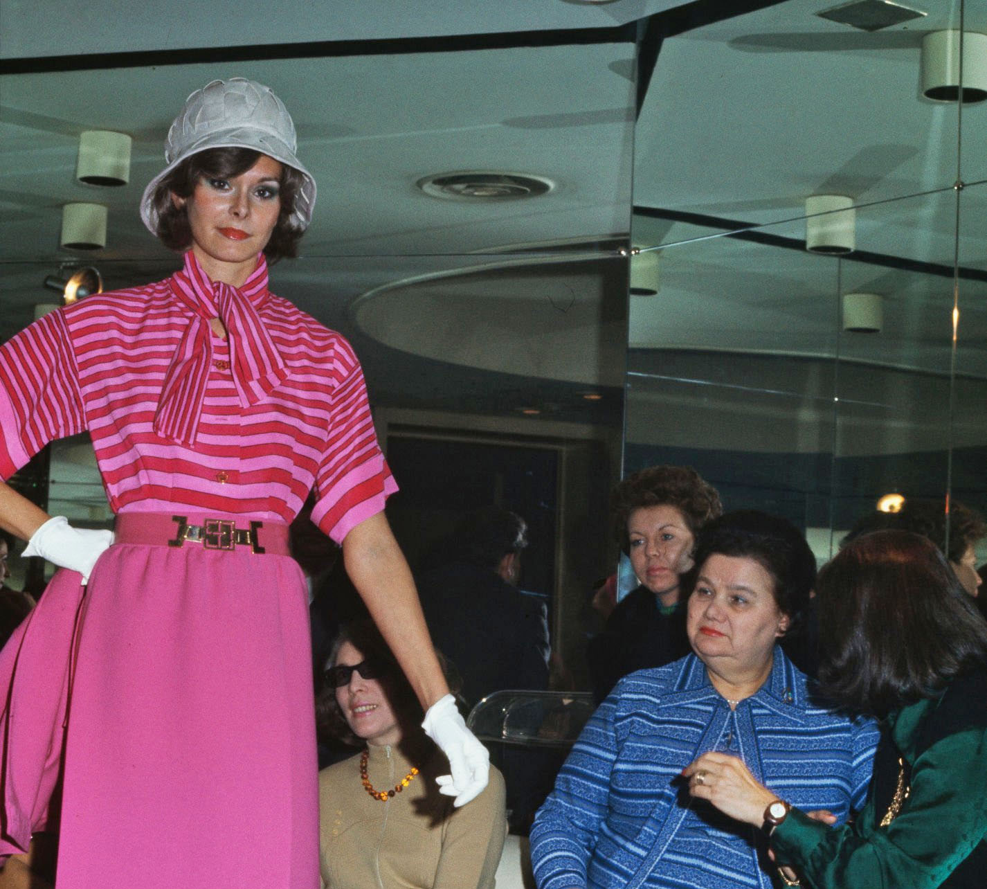 Lydia Gromyko (in blue) watches a model at a fashion show in Rome, Italy, on March 7th, 1974.jpg